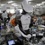 Robots will take jobs from humans, but later than thought