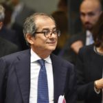 Italian government backs down on part of spending plans