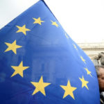 Italy backs down in EU budget truce