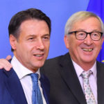 Italy waves white flag on budget