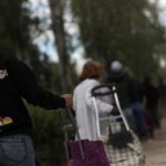 Feeling the pinch from coronavirus, Spain's new poor queue for basics