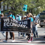 Basic income saved lives, say supporters, who rally in Denver for extension of cash assistance