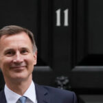 Hunt refuses to rule out shock income tax cut amid warnings of revolt if budget favours rich