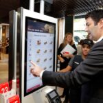 McDonald's touchscreen kiosks were feared as job killers. Instead, something surprising happened